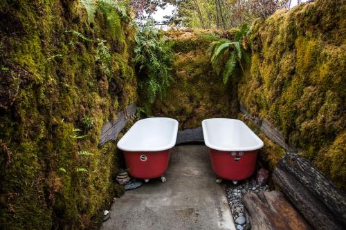 a bath tub sitting in the middle of a tunnel at The Front Porch Hidden Oasis in Arcata