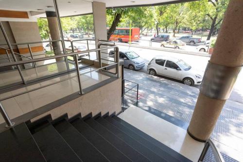 a staircase in a building with a parking lot at Best Parque - Pileta y Cochera - Solo autos in San Miguel de Tucumán
