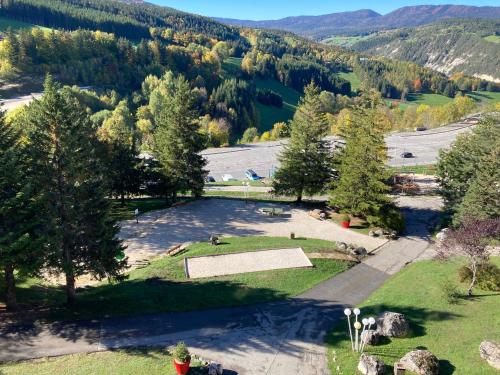 an aerial view of a park in the mountains at Au pied des pistes Côte 2000 - Le Balcon de Villard de Lans in Villard-de-Lans