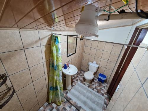 an overhead view of a bathroom with a toilet and a sink at Casa Tucan in Drake