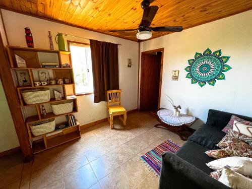 a living room with a couch and a ceiling at el PARAISO in Villa Anizacate