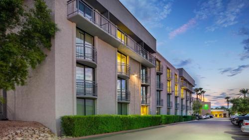 a rendering of an apartment building at Holiday Inn and Suites Phoenix Airport North by IHG in Phoenix