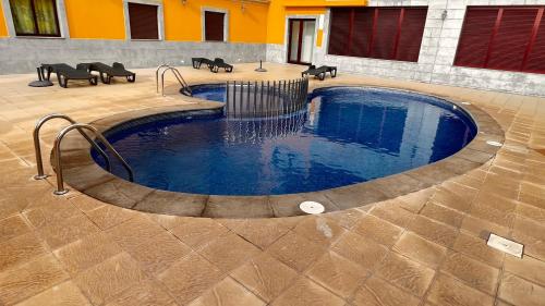 Bazén v ubytování El Rinconcito NVF nebo v jeho okolí