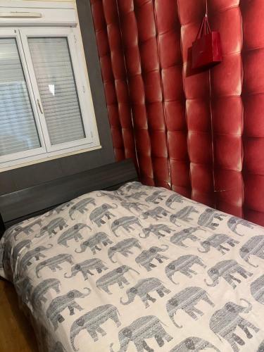 A bed or beds in a room at Appartement nice