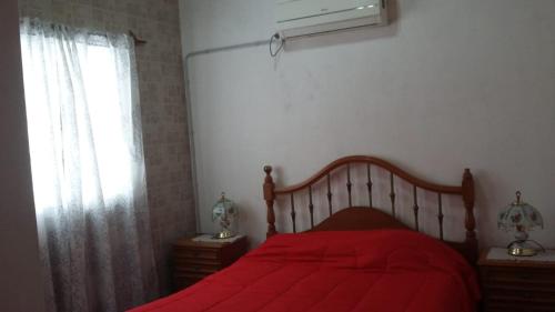 Una cama o camas en una habitación de Turismo en san Rafael Mendoza