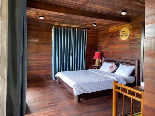 Giường trong phòng chung tại Freedom Jungle Resort