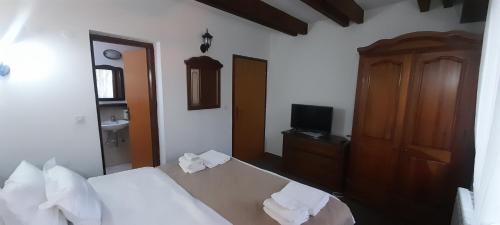 Säng eller sängar i ett rum på Teuta Palace Dom Faletići