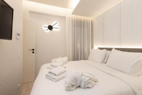 Postel nebo postele na pokoji v ubytování Incanto Boutique Suites - Mets