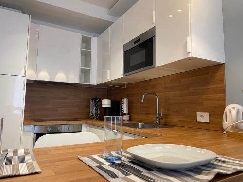 Η κουζίνα ή μικρή κουζίνα στο Saronno Urban Chic - Affitti Brevi Italia
