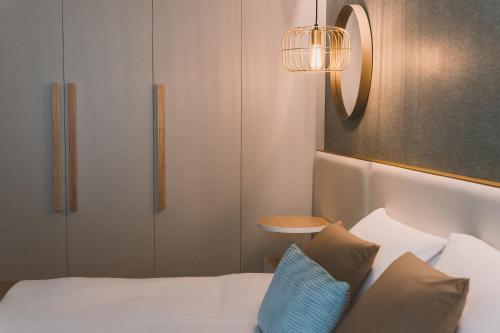 Ένα ή περισσότερα κρεβάτια σε δωμάτιο στο HOTEL CANDOR