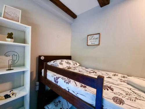 a bedroom with a bed in a room at Das Hostel Rijeka in Rijeka