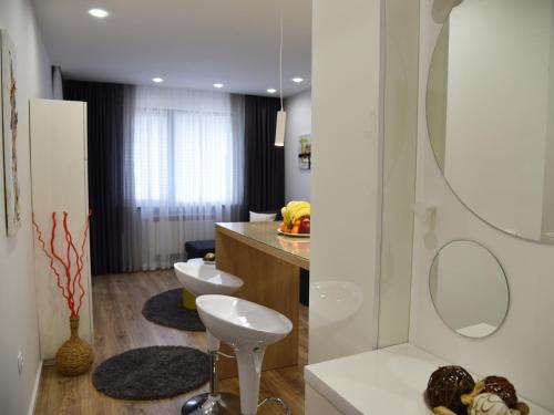 Et badeværelse på Borovets Gardens Luxury apartment E11