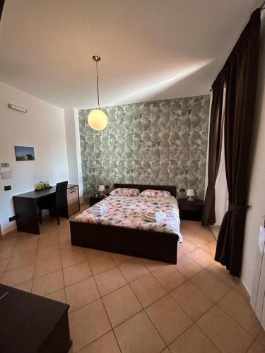 Ein Bett oder Betten in einem Zimmer der Unterkunft B&B Verdeoliva