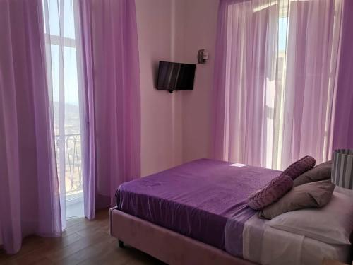 Postel nebo postele na pokoji v ubytování Antares Rooms