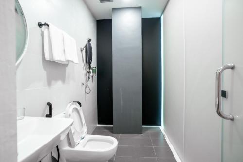 Koupelna v ubytování Norvinton Hotel