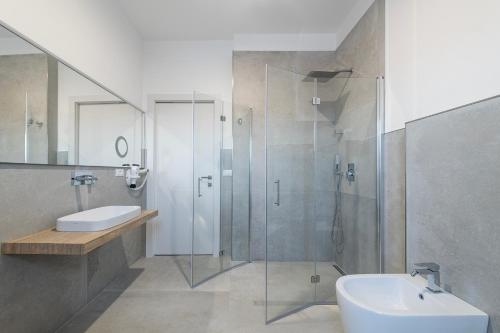 Koupelna v ubytování Azzurra Aparthotel