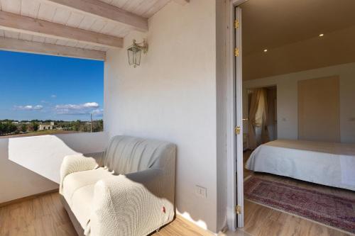 Tempat tidur dalam kamar di Villa Nina by Perle di Puglia