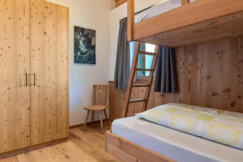 Postel nebo postele na pokoji v ubytování Guntschöllerhof Mendelkamm