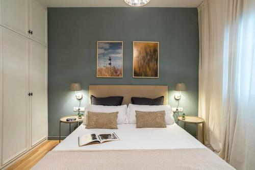 Posteľ alebo postele v izbe v ubytovaní Modern stylish 3 bedroom Arco de Triunfo