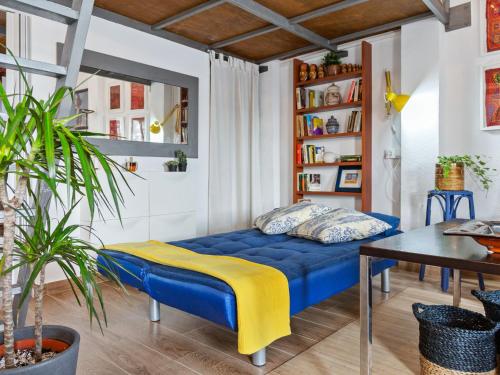 Postel nebo postele na pokoji v ubytování Belvilla by OYO Apartamento Loft Sorrapa