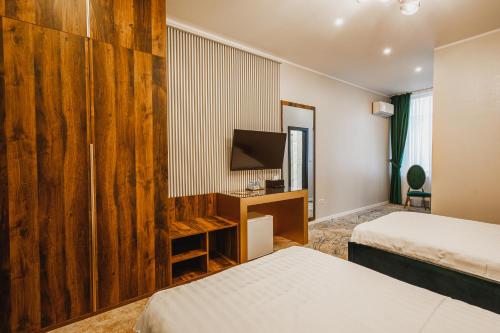 Ένα ή περισσότερα κρεβάτια σε δωμάτιο στο Motel Andra