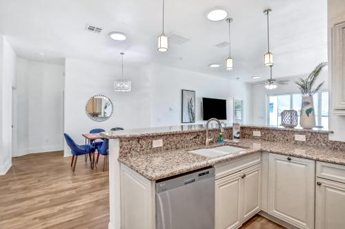 a kitchen with a sink and a counter top at Indian Rocks Beach Hideaway in Clearwater Beach