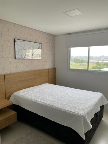 Cama o camas de una habitación en Apartamento 2 quartos c/ Piscina 3 Ar-condicionado