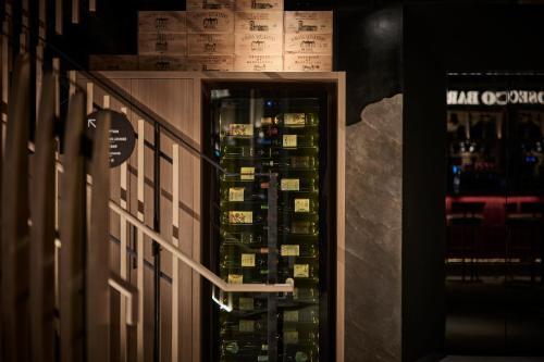 a room with a bunch of boxes of wine at The Royal Park Canvas Ginza Corridor in Tokyo