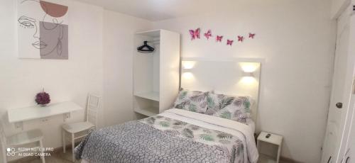 Llit o llits en una habitació de Habitación Marlene
