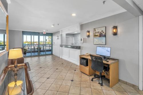 an office with a desk with a computer on it at La Quinta Inn by Wyndham Cleveland Independence in Independence