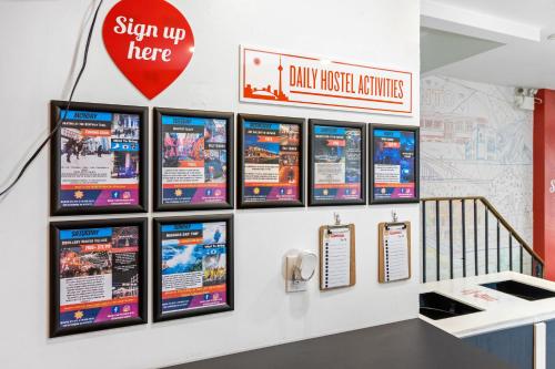 a display of video game signs on a wall at Samesun Toronto in Toronto