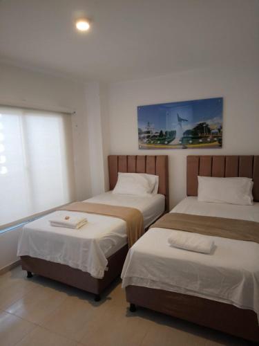 Кровать или кровати в номере Villalba Boutique Hotel