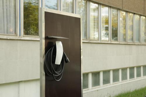 a door with a phone on the side of a building at Ootel.com in Berlin