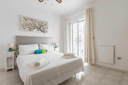 Postel nebo postele na pokoji v ubytování Casa Jerez 14 en Nerja