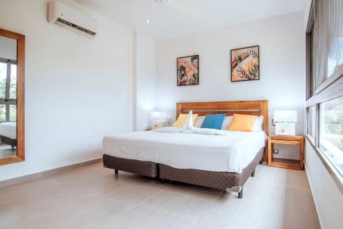 Ένα ή περισσότερα κρεβάτια σε δωμάτιο στο 3 Bedroom Pool Villa 50M To The Beach
