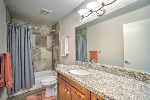 a bathroom with a sink and a toilet and a shower at Flagstaff Townhome with Grill about 3 Mi to Dtwn in Flagstaff