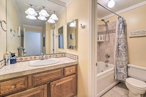 a bathroom with a sink and a tub and a toilet at Cozy Incline Village Condo Less Than 3 Mi to Lake Tahoe! in Incline Village