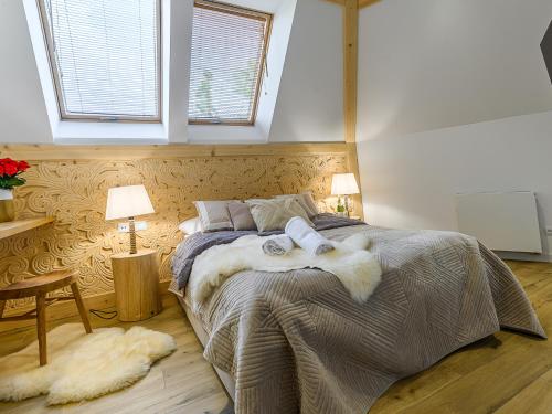 Posteľ alebo postele v izbe v ubytovaní VisitZakopane - Palermo Apartment