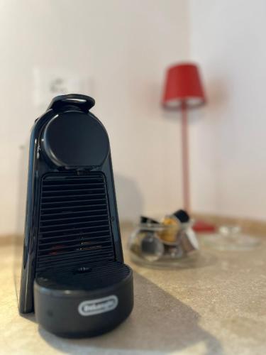 a black object sitting on top of a counter at Bolgheri Bramasole in Bolgheri