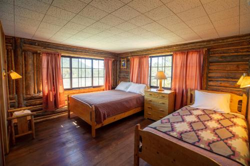 Katil atau katil-katil dalam bilik di The Meeker Park Lodge