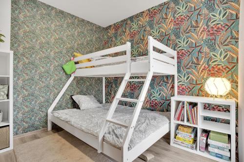 Postel nebo postele na pokoji v ubytování SKI Berg Klínovec