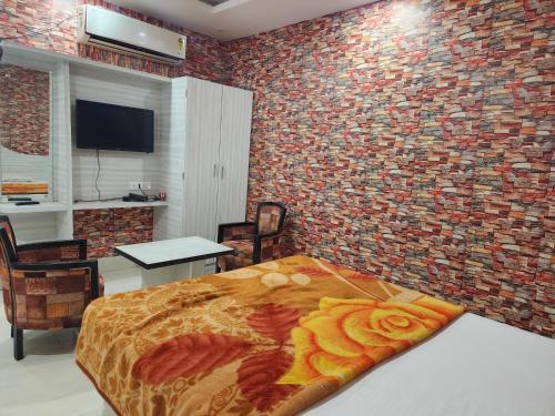 Katil atau katil-katil dalam bilik di Golden Park Inn