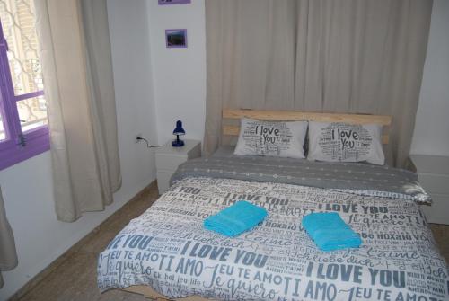 Ένα ή περισσότερα κρεβάτια σε δωμάτιο στο Apartments COMFY - for a quiet family holiday