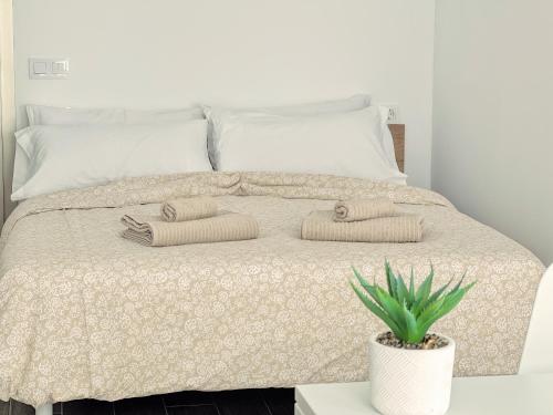 Кровать или кровати в номере Lola Loft 5 Lajares iRent Fuerteventura