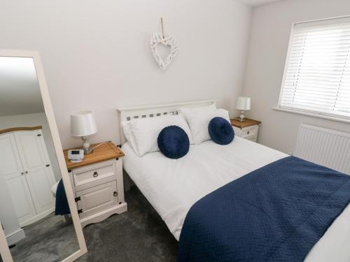Katil atau katil-katil dalam bilik di LunaRoxx, 6 Meadow Gardens, Kilgetty