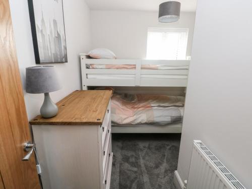 Katil atau katil-katil dalam bilik di LunaRoxx, 6 Meadow Gardens, Kilgetty