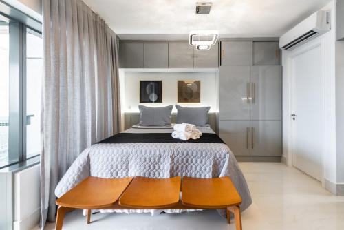 Katil atau katil-katil dalam bilik di Rosemari's Apartments 4 Studios Luxuosos