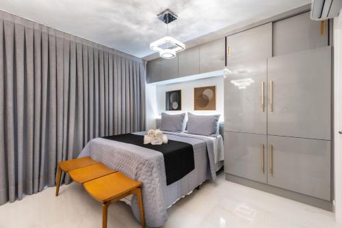 Katil atau katil-katil dalam bilik di Rosemari's Apartments 4 Studios Luxuosos