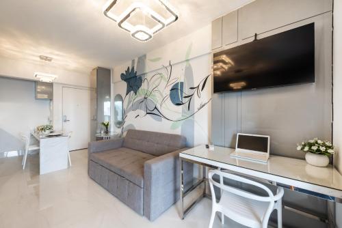 Televisyen dan/atau pusat hiburan di Rosemari's Apartments 4 Studios Luxuosos