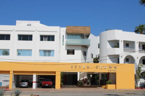 a rendering of the exterior of the seven borough hotel at Seven Crown Express & Suites by Kavia in Cabo San Lucas